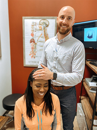 Chiropractor Frederick MD Adam Smith Spinal Exam Chiropractor Frederick MD Adam Smith Spinal Exam