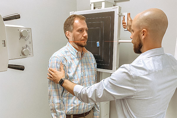 Chiropractor Frederick MD Adam Smith Taking X-ray Chiropractor Frederick MD Adam Smith Taking X-ray