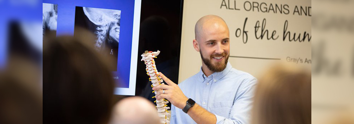 Chiropractor Frederick MD Adam Smith Explaining Spine